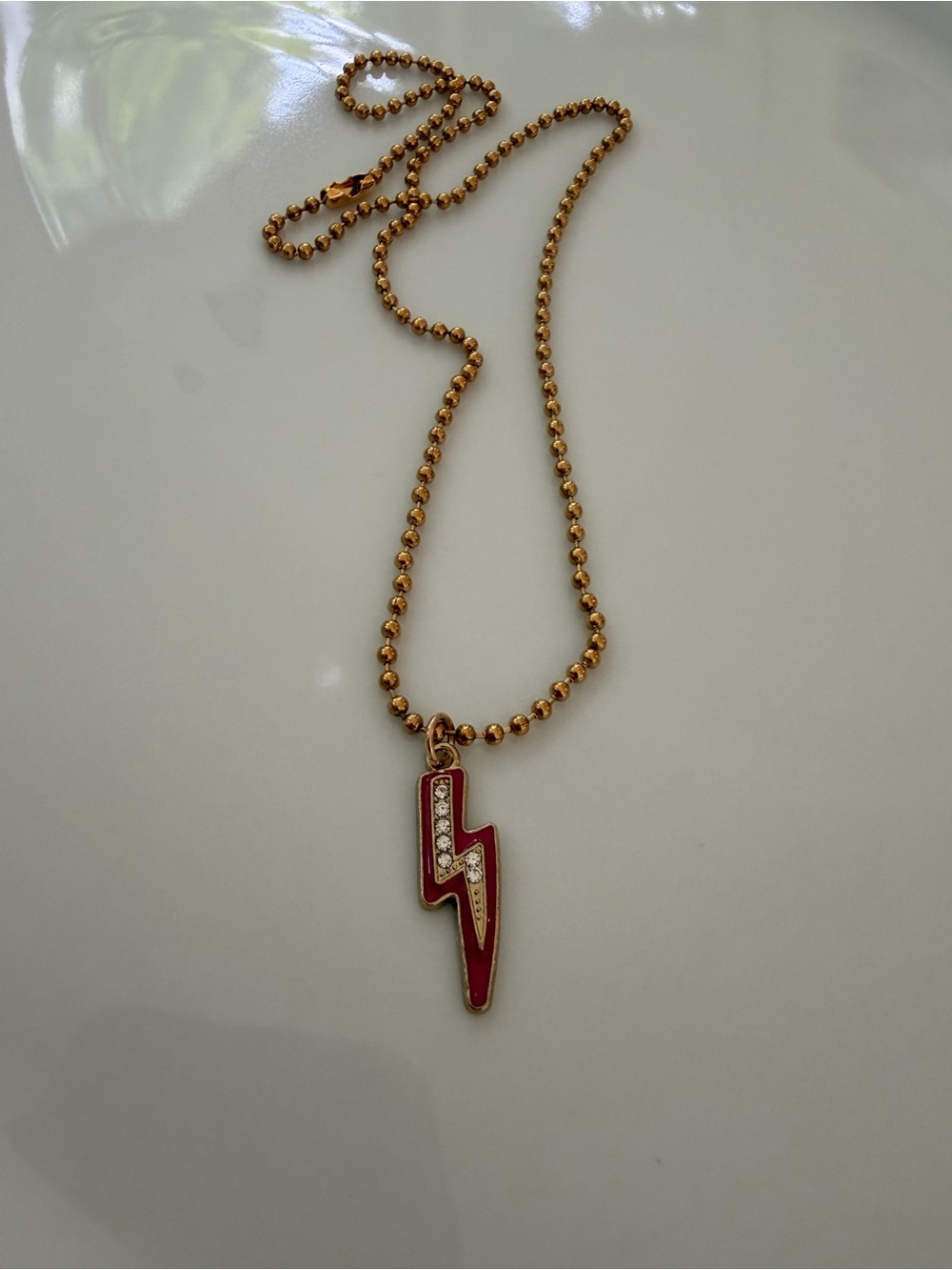 LileeLoo Gold-Tone Lightning Bolt Pendant Necklace with Red Enamel and Crystals